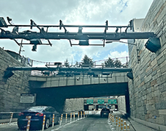 Cashless overhead toll system