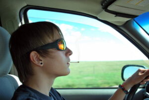 Man driving and smoking pot